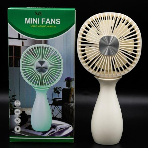 Beige vase-style mini USB rechargeable fan standing next to its green packaging box.